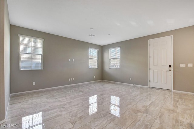 4 Lomita Heights Dr, Las Vegas, NV 89138 - unfurnished room featuring healthy amount of natural light and baseboards