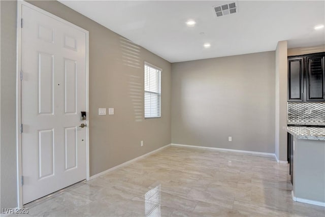 4 Lomita Heights Dr, Las Vegas, NV 89138 - foyer featuring light marble finish flooring, baseboards, and recessed lighting