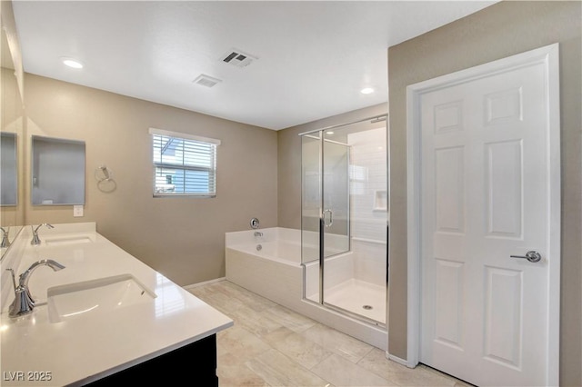 4 Lomita Heights Dr, Las Vegas, NV 89138 - bathroom with double vanity, a garden tub, a stall shower, recessed lighting, and baseboards