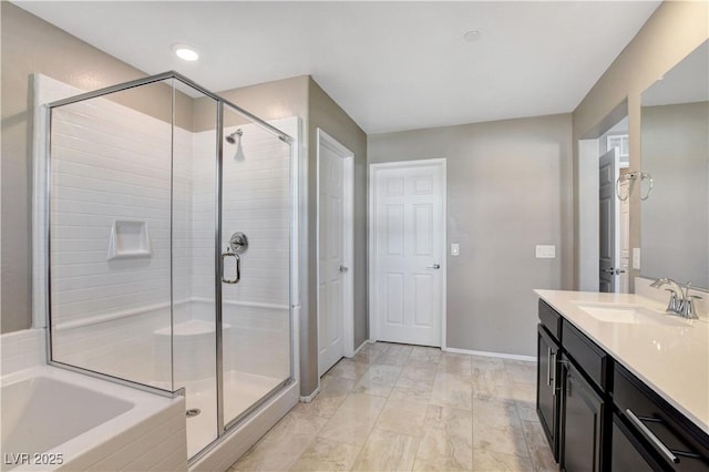 4 Lomita Heights Dr, Las Vegas, NV 89138 - full bath featuring a stall shower, vanity, a garden tub, and baseboards