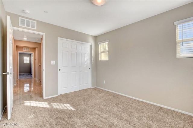 4 Lomita Heights Dr, Las Vegas, NV 89138 - unfurnished bedroom with carpet floors, multiple windows, baseboards, and a closet