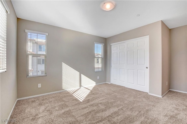 4 Lomita Heights Dr, Las Vegas, NV 89138 - unfurnished bedroom featuring carpet flooring, a closet, and baseboards