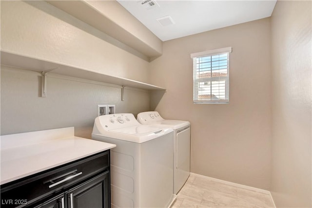4 Lomita Heights Dr, Las Vegas, NV 89138 - washroom featuring cabinet space, washer and dryer, light marble finish flooring, and baseboards