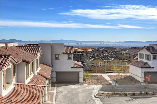 4 Lomita Heights Dr, Las Vegas, NV 89138 - aerial perspective of suburban area with a mountainous background