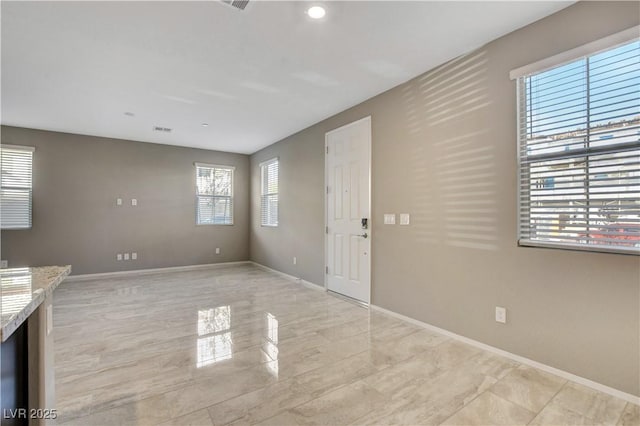 4 Lomita Heights Dr, Las Vegas, NV 89138 - unfurnished living room featuring baseboards and recessed lighting