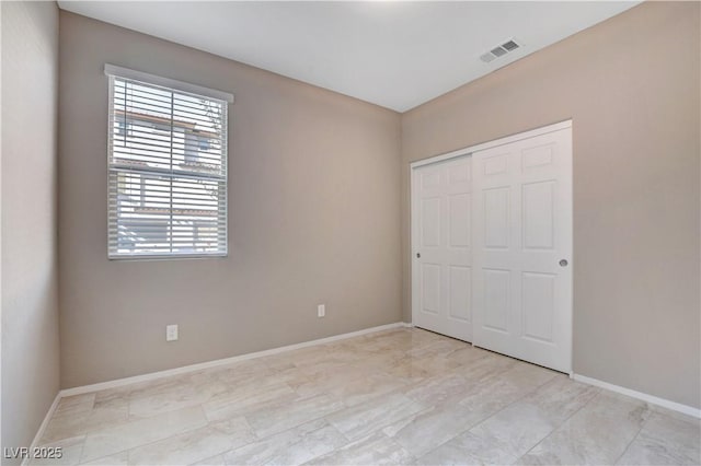 4 Lomita Heights Dr, Las Vegas, NV 89138 - unfurnished bedroom featuring baseboards and a closet