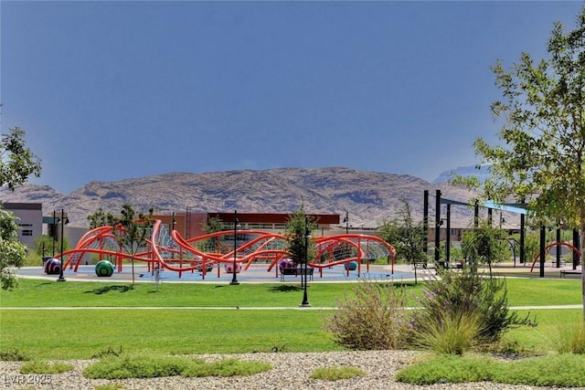 4 Lomita Heights Dr, Las Vegas, NV 89138 - surrounding community with a mountain view and a yard