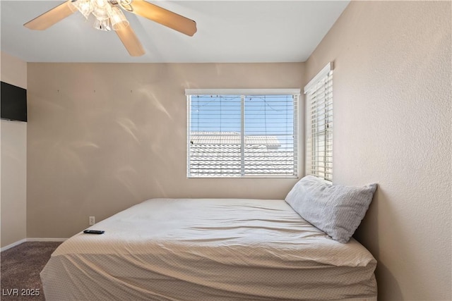 1906 Desert Sage Ave, North Las Vegas, NV 89031 - bedroom with carpet flooring, multiple windows, and ceiling fan