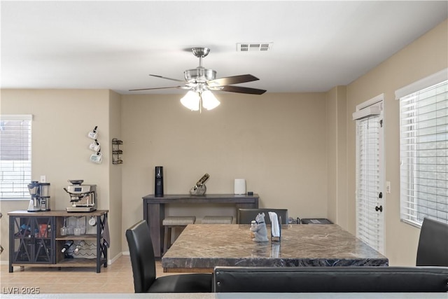 1906 Desert Sage Ave, North Las Vegas, NV 89031 - tiled dining room featuring healthy amount of natural light and ceiling fan