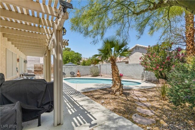 1906 Desert Sage Ave, North Las Vegas, NV 89031 - view of pool with a pergola, a fenced backyard, and a patio area