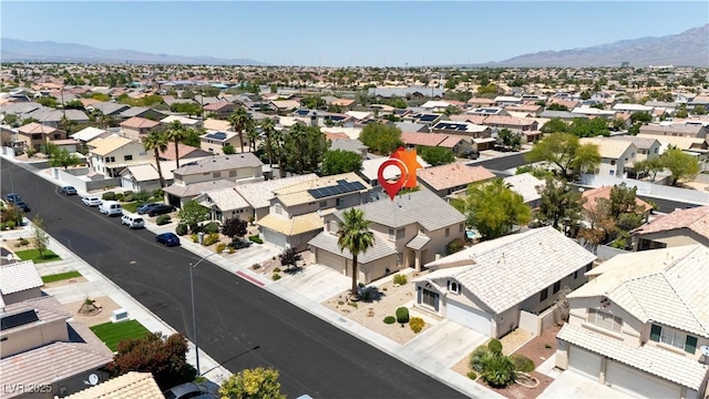 1906 Desert Sage Ave, North Las Vegas, NV 89031 - aerial view of residential area featuring a mountainous background