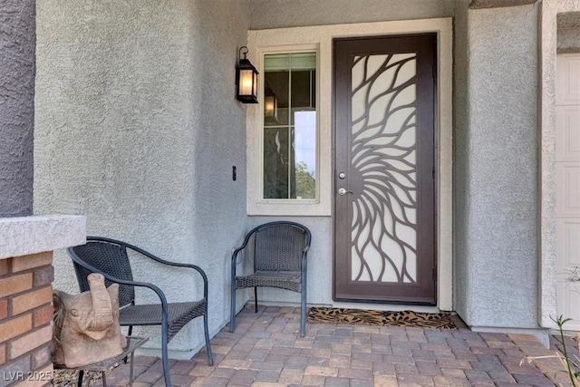 676 Otter Brook St, Henderson, NV 89011 - doorway to property with stucco siding