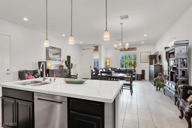 676 Otter Brook St, Henderson, NV 89011 - kitchen with open floor plan, dishwasher, a sink, an island with sink, and recessed lighting