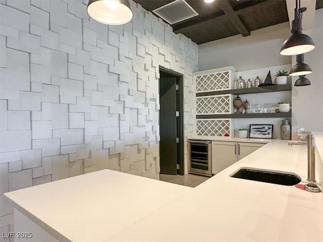 676 Otter Brook St, Henderson, NV 89011 - indoor dry bar featuring beverage cooler, pendant lighting, and beamed ceiling