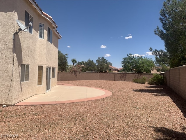 10357 Bent Willow Ave, Las Vegas, NV 89129 - fenced backyard with a patio