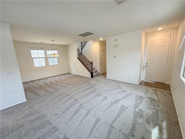 7815 Shingle Beach St, Las Vegas, NV 89166 - empty room with stairs, a chandelier, carpet, recessed lighting, and baseboards