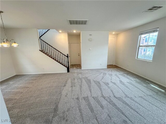 7815 Shingle Beach St, Las Vegas, NV 89166 - unfurnished living room featuring stairs, a chandelier, baseboards, carpet flooring, and recessed lighting