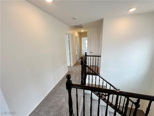 7815 Shingle Beach St, Las Vegas, NV 89166 - hall with an upstairs landing, carpet floors, and baseboards