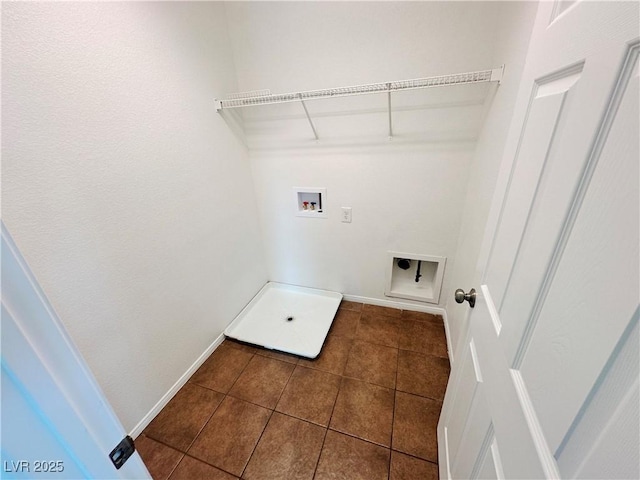 7815 Shingle Beach St, Las Vegas, NV 89166 - laundry area with dark tile patterned flooring, washer hookup, baseboards, and electric dryer hookup