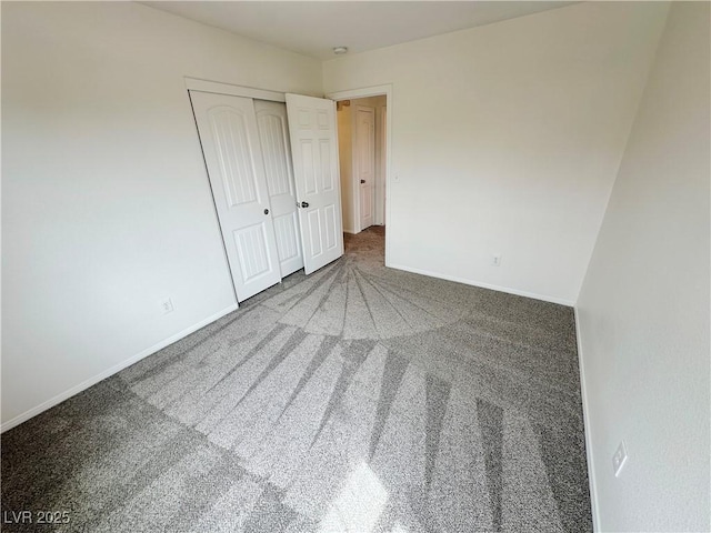 7815 Shingle Beach St, Las Vegas, NV 89166 - unfurnished bedroom featuring carpet floors, baseboards, and a closet