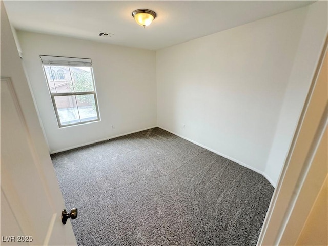 7815 Shingle Beach St, Las Vegas, NV 89166 - empty room featuring dark carpet and baseboards