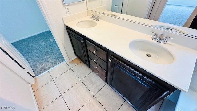7815 Shingle Beach St, Las Vegas, NV 89166 - full bath with double vanity, tile patterned floors, and baseboards