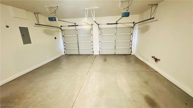 7815 Shingle Beach St, Las Vegas, NV 89166 - garage with baseboards, electric panel, and a garage door opener