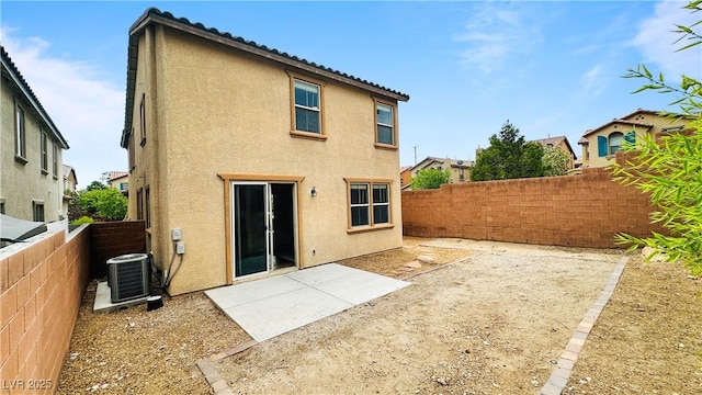 7815 Shingle Beach St, Las Vegas, NV 89166 - rear view of house featuring central AC unit, stucco siding, a fenced backyard, and a patio area