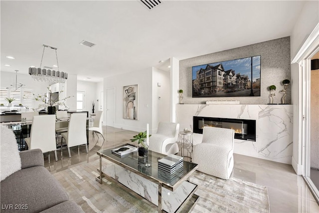 10532 Redwood Ash Ave, Las Vegas, NV 89144 - living area featuring a premium fireplace and recessed lighting