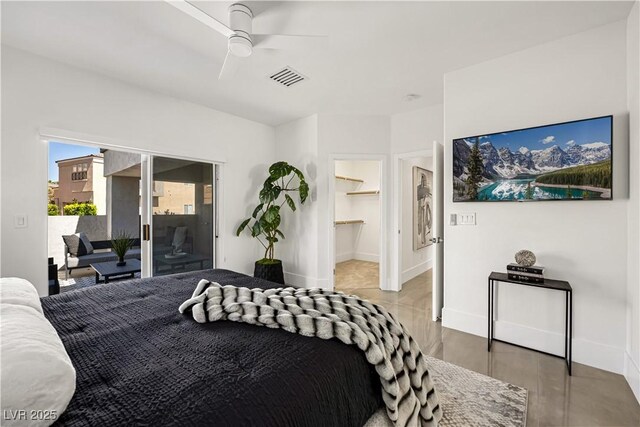 10532 Redwood Ash Ave, Las Vegas, NV 89144 - bedroom with ceiling fan, a walk in closet, access to exterior, and light wood finished floors