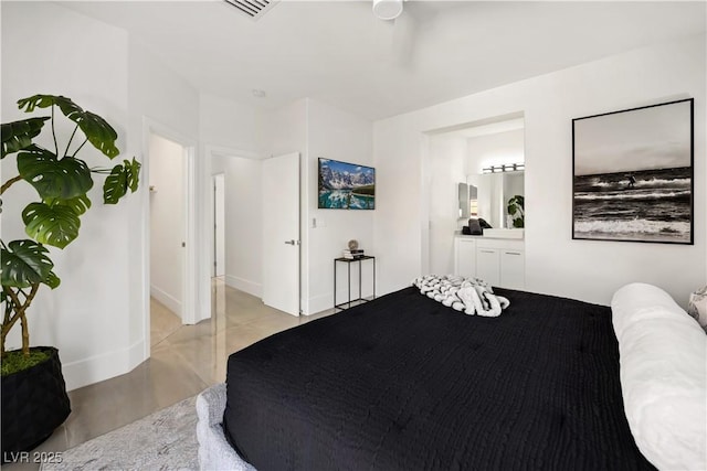 10532 Redwood Ash Ave, Las Vegas, NV 89144 - bedroom featuring baseboards and connected bathroom