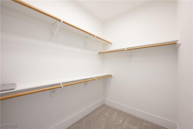 10532 Redwood Ash Ave, Las Vegas, NV 89144 - spacious closet featuring light carpet