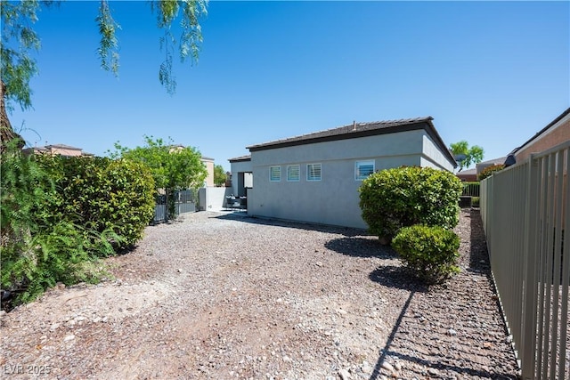 10532 Redwood Ash Ave, Las Vegas, NV 89144 - rear view of property with stucco siding