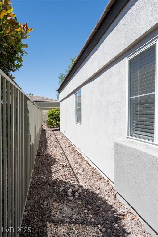 10532 Redwood Ash Ave, Las Vegas, NV 89144 - view of side of home with stucco siding