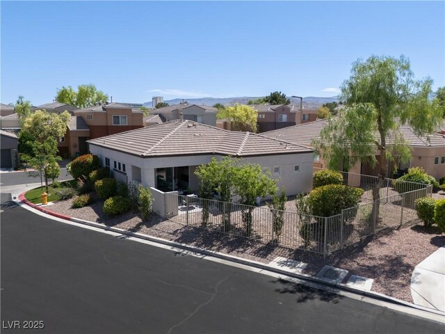 10532 Redwood Ash Ave, Las Vegas, NV 89144 - view of front of property featuring a residential view, a tiled roof, and stucco siding