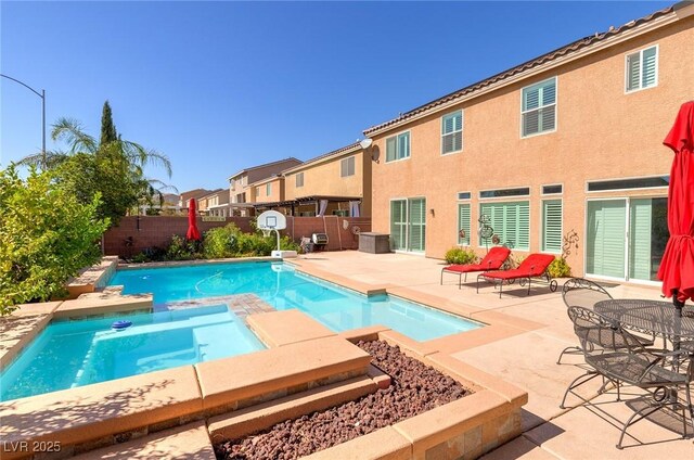 6403 Brandon Hills Ct, Las Vegas, NV 89139 - view of swimming pool featuring a fenced backyard, a patio area, a residential view, and a pool with connected hot tub