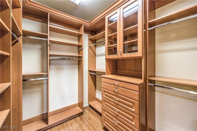 5162 Estasi St, Las Vegas, NV 89135 - spacious closet with light wood finished floors