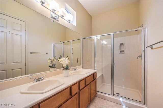 5162 Estasi St, Las Vegas, NV 89135 - full bathroom featuring double vanity, a stall shower, and tile patterned flooring