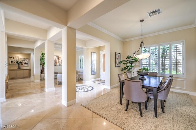 5162 Estasi St, Las Vegas, NV 89135 - dining area with baseboards, crown molding, and light tile patterned flooring