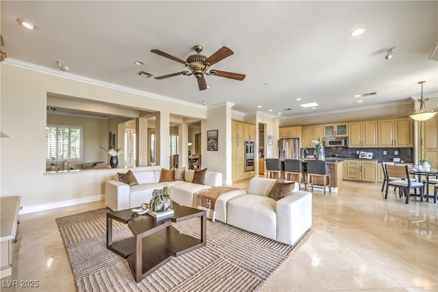 5162 Estasi St, Las Vegas, NV 89135 - living area featuring ornamental molding, a ceiling fan, recessed lighting, and baseboards