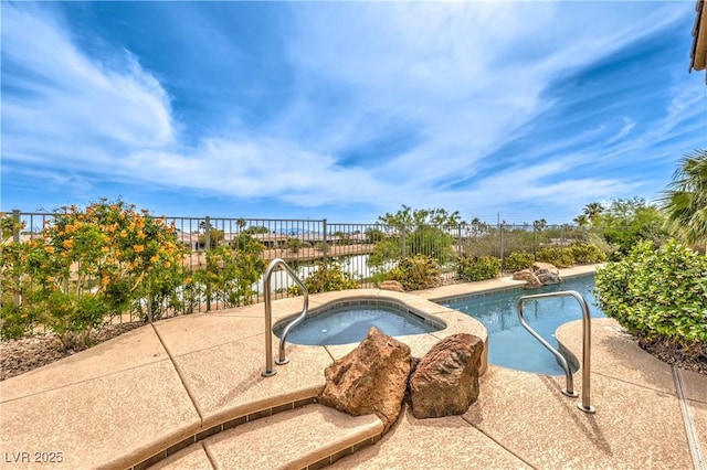 5162 Estasi St, Las Vegas, NV 89135 - view of swimming pool with an in-ground hot tub and a patio area