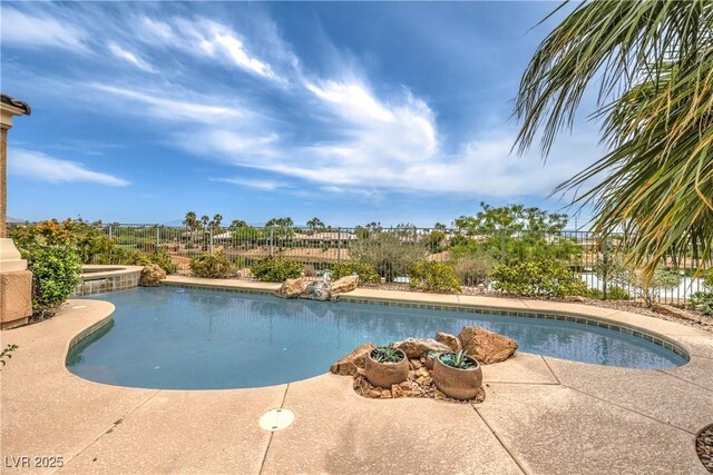 5162 Estasi St, Las Vegas, NV 89135 - view of pool with a fenced backyard, a pool with connected hot tub, and a patio area