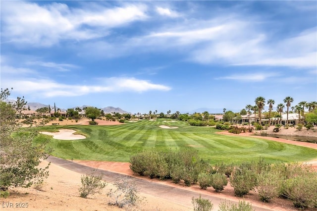 5162 Estasi St, Las Vegas, NV 89135 - view of community featuring golf course view, a mountain view, and a yard