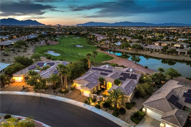 5162 Estasi St, Las Vegas, NV 89135 - aerial view of residential area with a local golf course and a water and mountain view