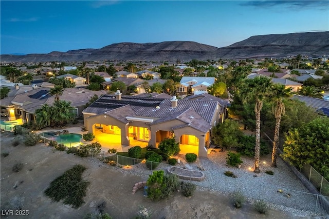 5162 Estasi St, Las Vegas, NV 89135 - aerial perspective of suburban area with a mountain backdrop