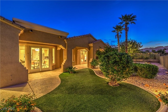 5162 Estasi St, Las Vegas, NV 89135 - back of house featuring french doors and stucco siding