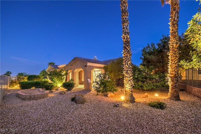 5162 Estasi St, Las Vegas, NV 89135 - view of front of house featuring stucco siding, a tile roof, and a chimney