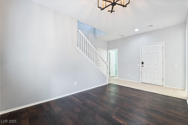 2482 Denholme St, Henderson, NV 89044 - entrance foyer with stairway, wood finished floors, a chandelier, baseboards, and recessed lighting