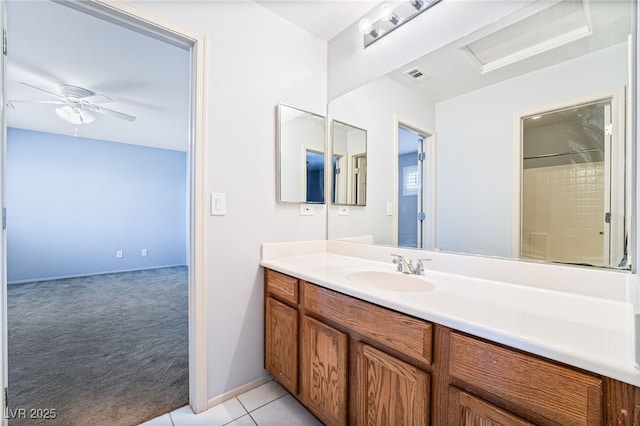 2482 Denholme St, Henderson, NV 89044 - bathroom featuring vanity, a ceiling fan, and tile patterned floors
