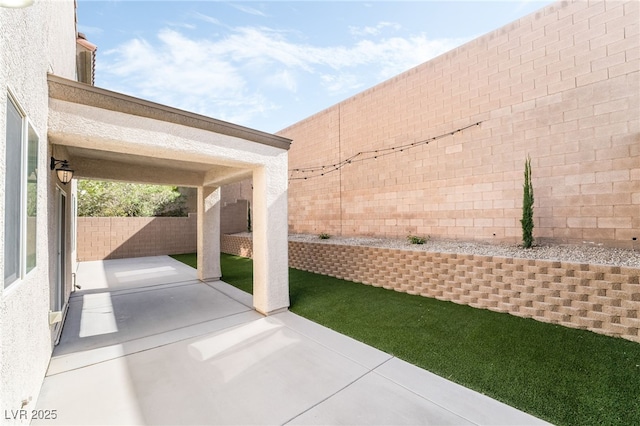 2482 Denholme St, Henderson, NV 89044 - fenced backyard with a patio